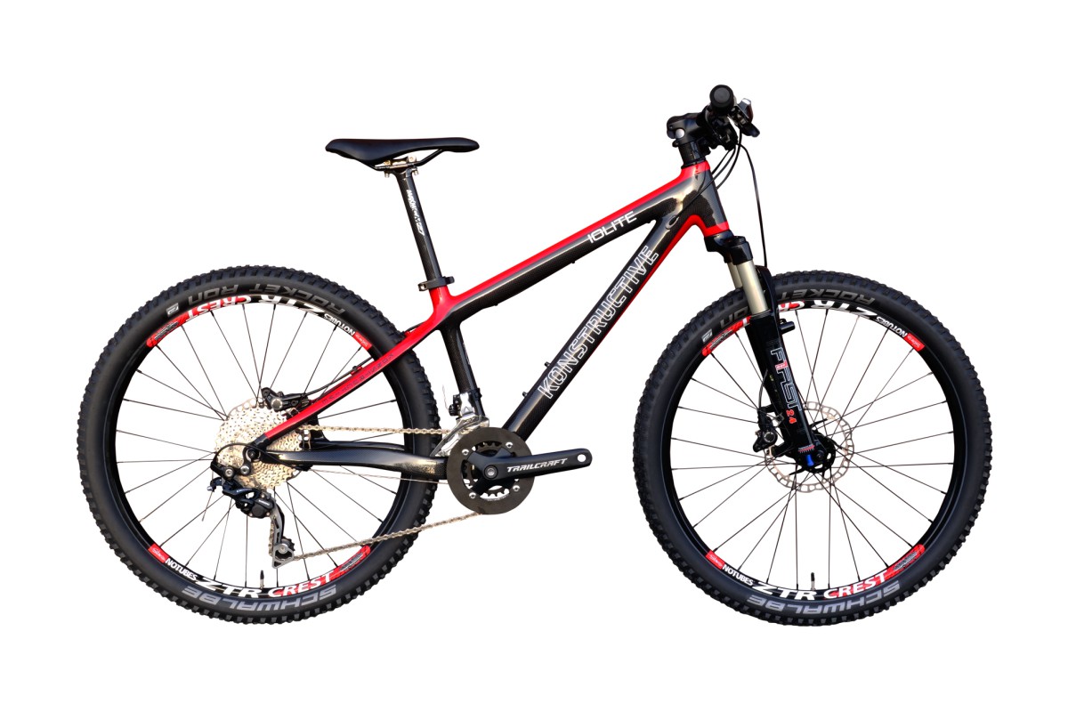 KONSTRUCTIVE Iolite Kids, 24", Carbon/Rot mit Shimano Deore, RST First 24 Air,  ZTR Crest Wheels